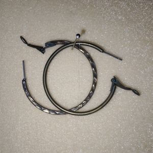 Bronze hammered hoop earrings.